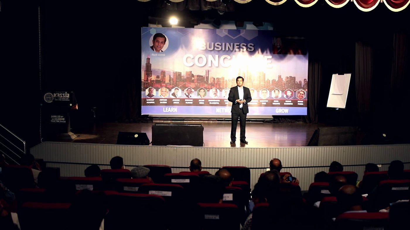 Raam Anand on stage at a business conclave